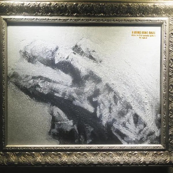 Album artwork for A Broke Moon Rises by Papa M