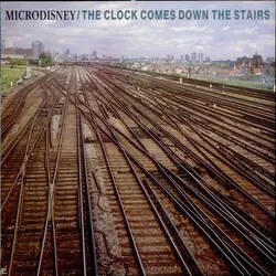 Album artwork for The Clock Comes Down The stairs by Microdisney